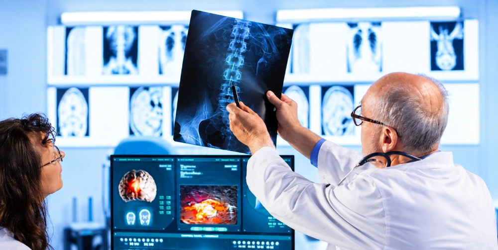 Clinical Radiologists Reviewing Digital X-Ray Scans